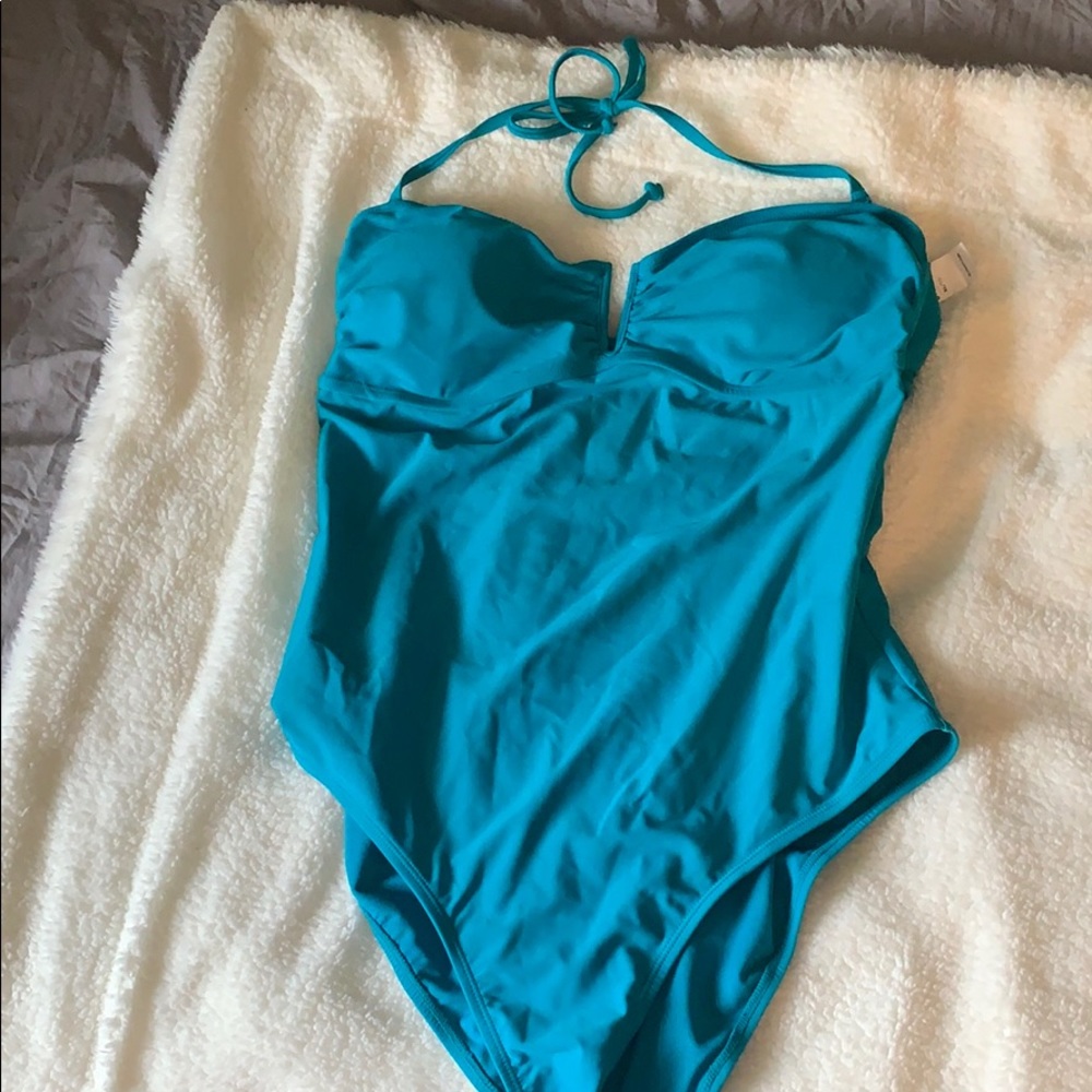 Brand new old navy one piece. NEVER WORN.